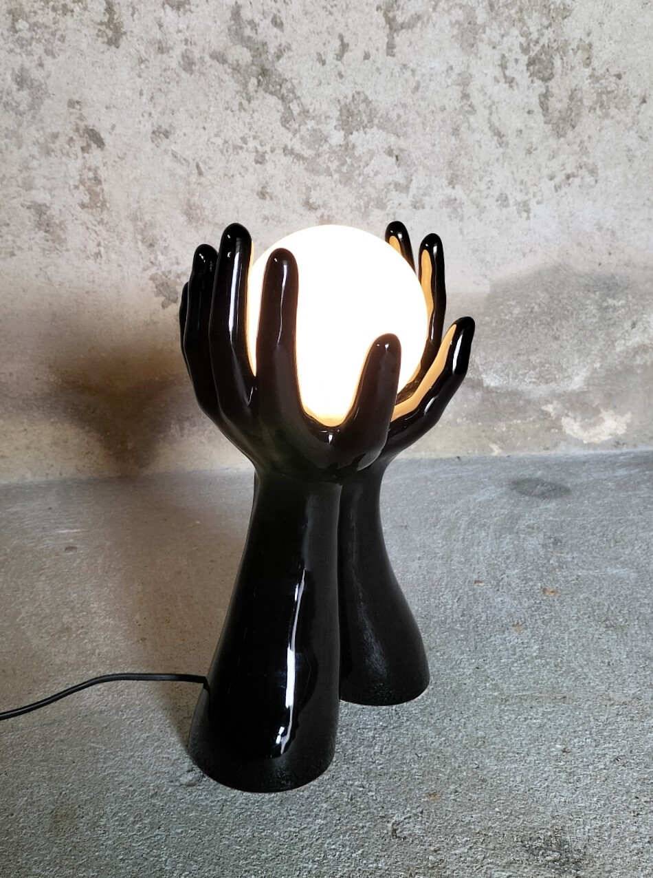 Black and white opaline hand lamp.
