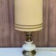 Vintage lamp in gold metal and white opal from the 1970s.