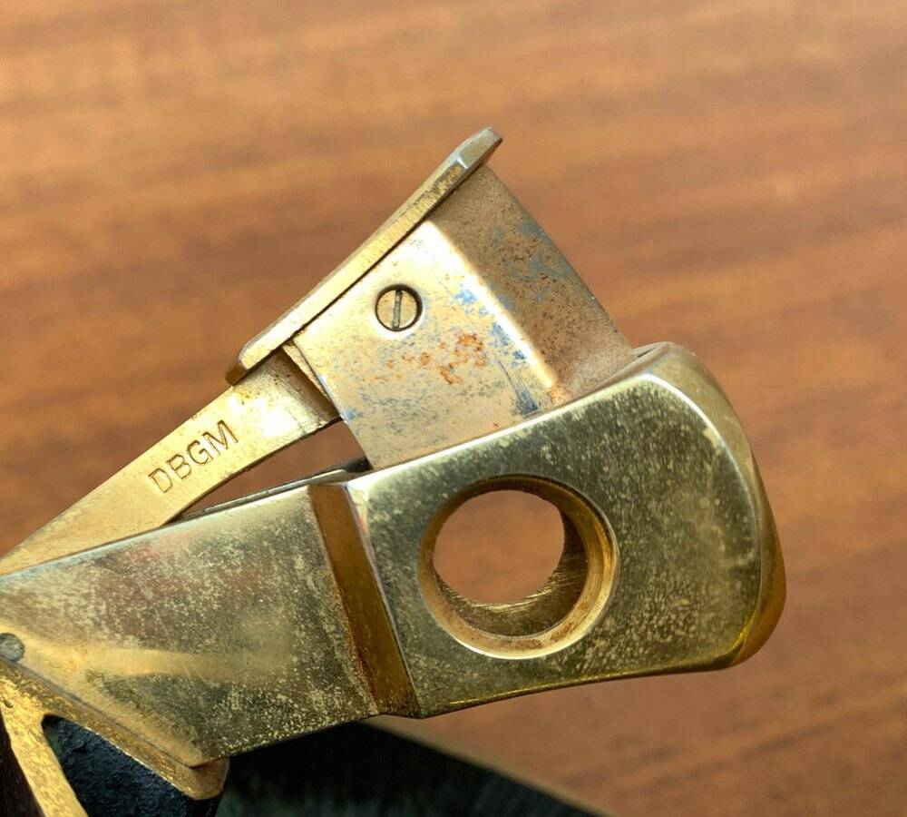 German brass ashtray with cigar cutter, 1950s.