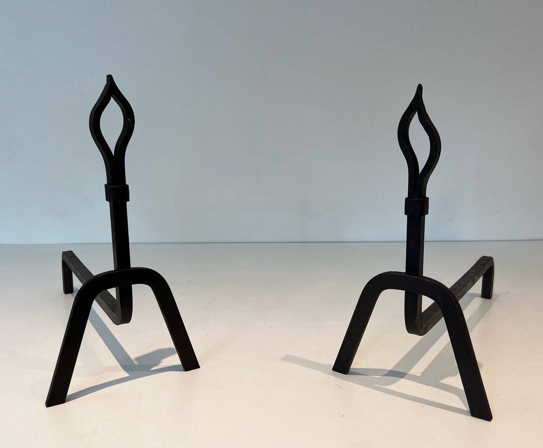 Pair of Modernist Andirons in Wrought Iron with Stylised Torches and Bases Ang
