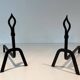 Pair of Modernist Andirons in Wrought Iron with Stylised Torches and Bases Ang