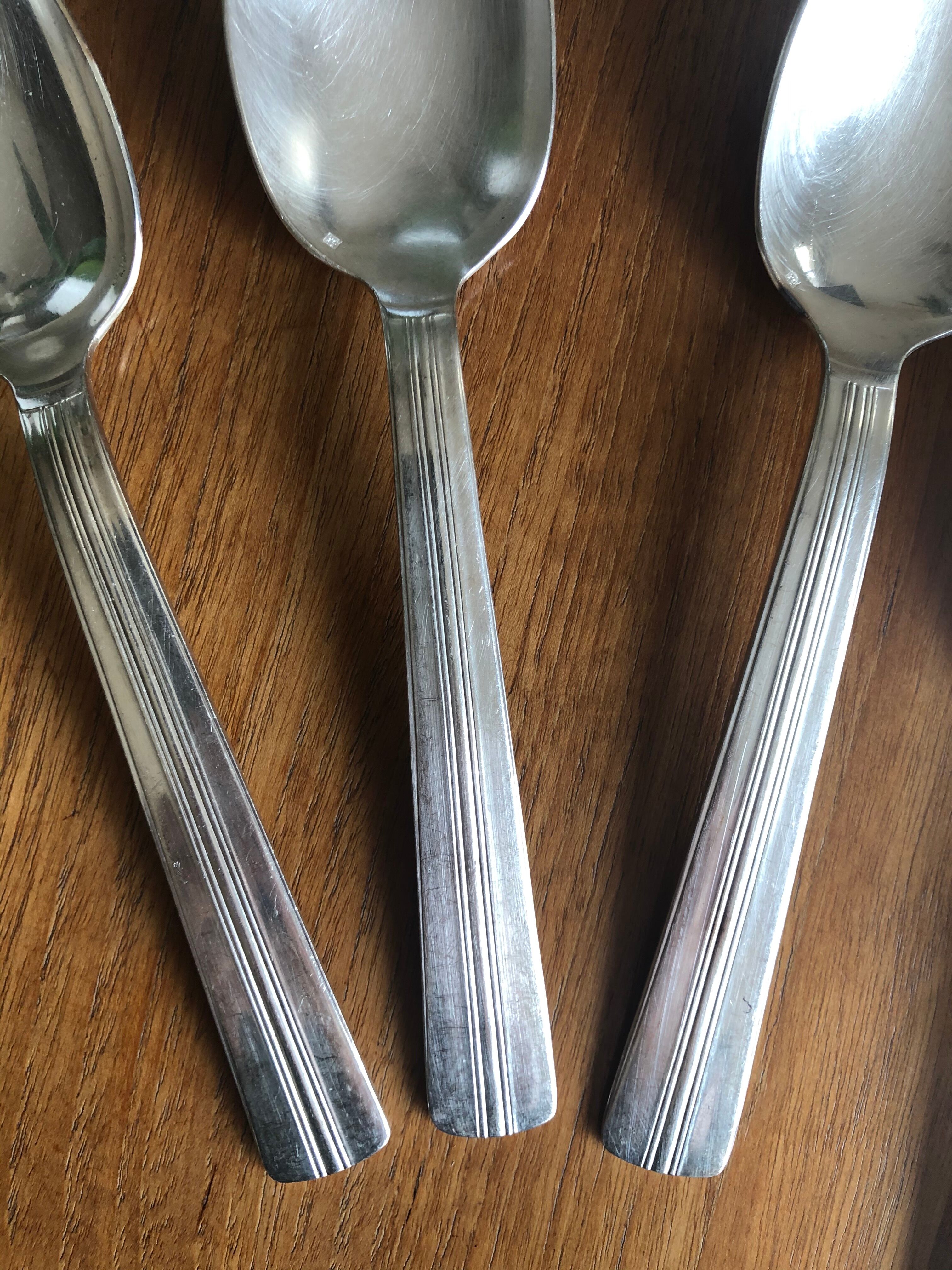 12 Soup spoons Ercuis in silver metal