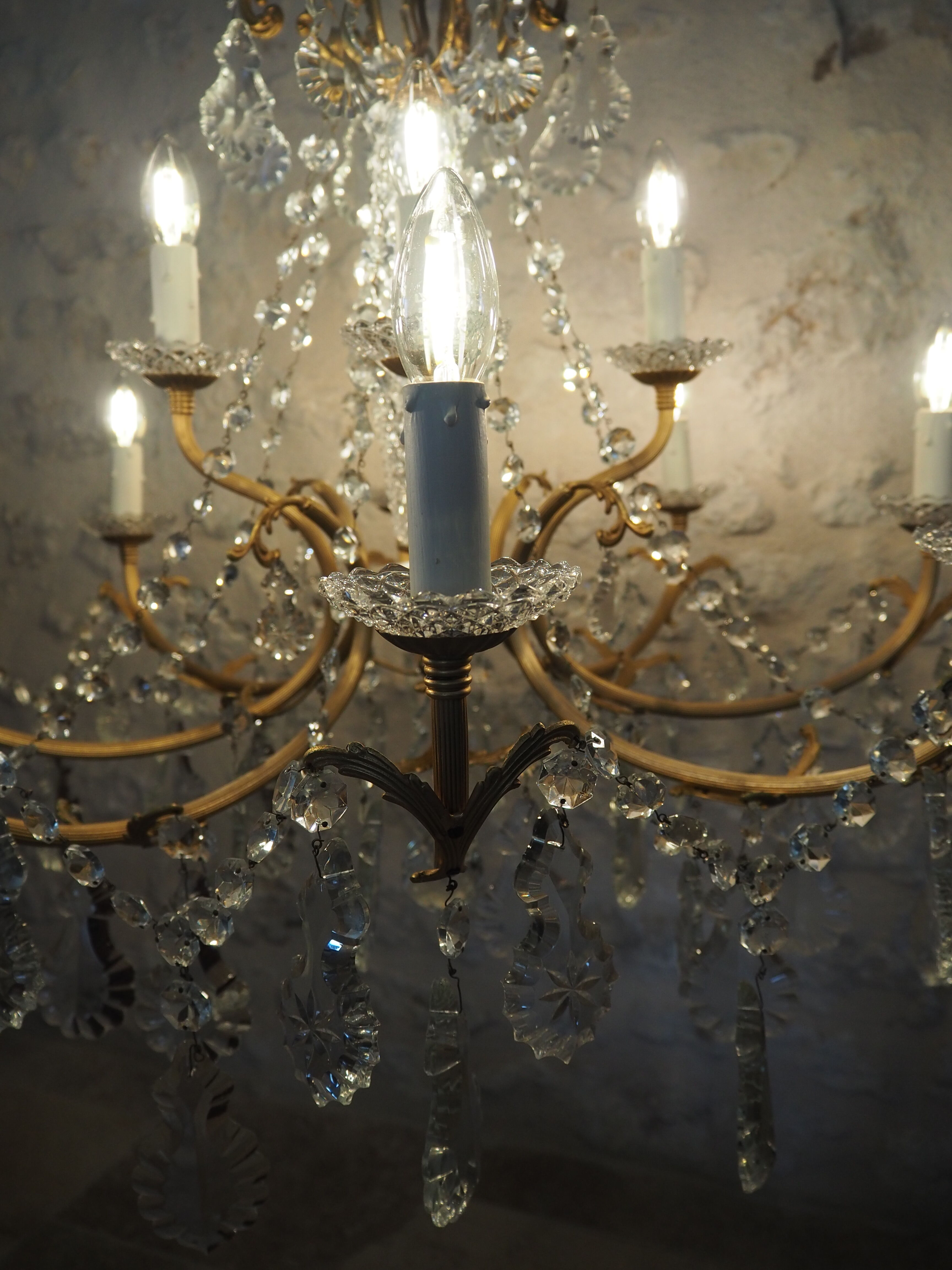 Chandelier 12 lamps with grapevines in crystal, bronze and regulated