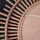 Very large sun mirror in rattan.