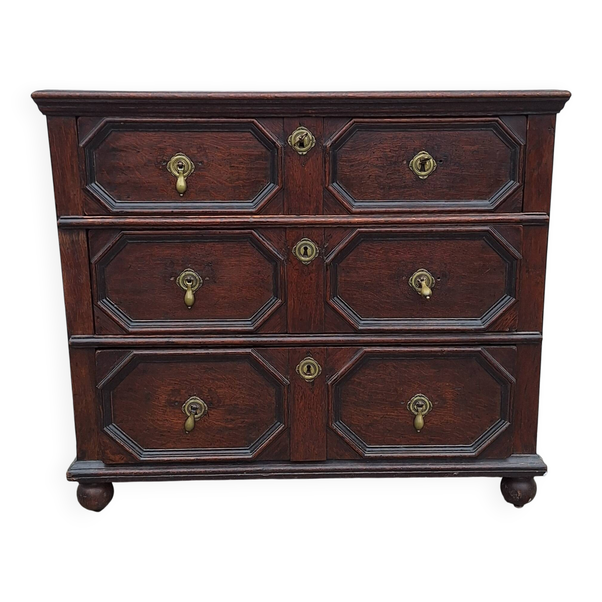 Jacobean style wooden chest of drawers