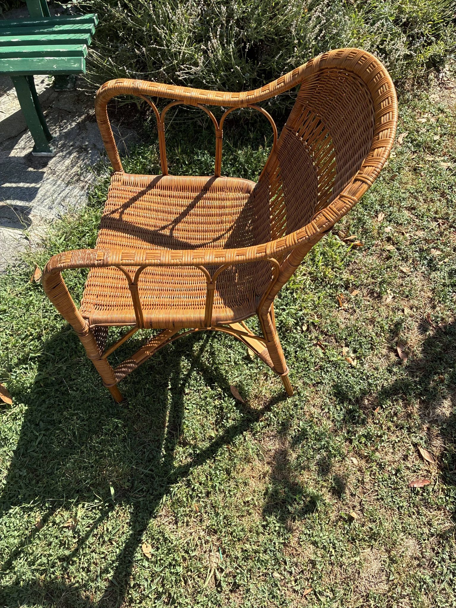 Vintage colonial lounge chair in rattan, pre-1950s.