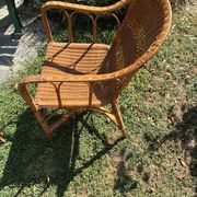 Vintage colonial lounge chair in rattan, pre-1950s.