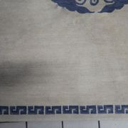 Vintage handmade 4.8' x 6.1' (147 cm x 187 cm) Tibetan Khaden rug from the 1970s