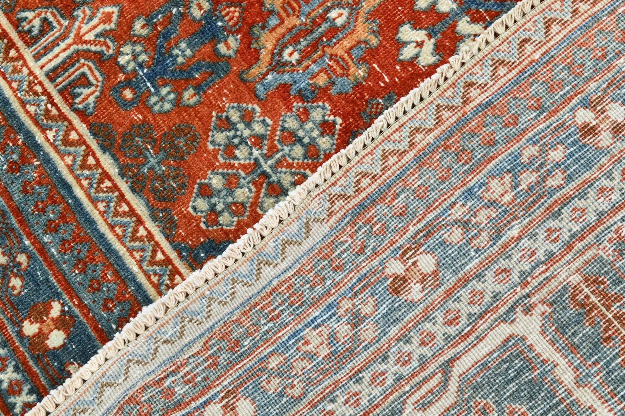 Vintage Turkish rug in brick red and indigo with floral design, 276 × 389 cm