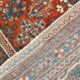 Vintage Turkish rug in brick red and indigo with floral design, 276 × 389 cm