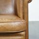 Fauteuil club en cuir de vachette couleur cognac clair