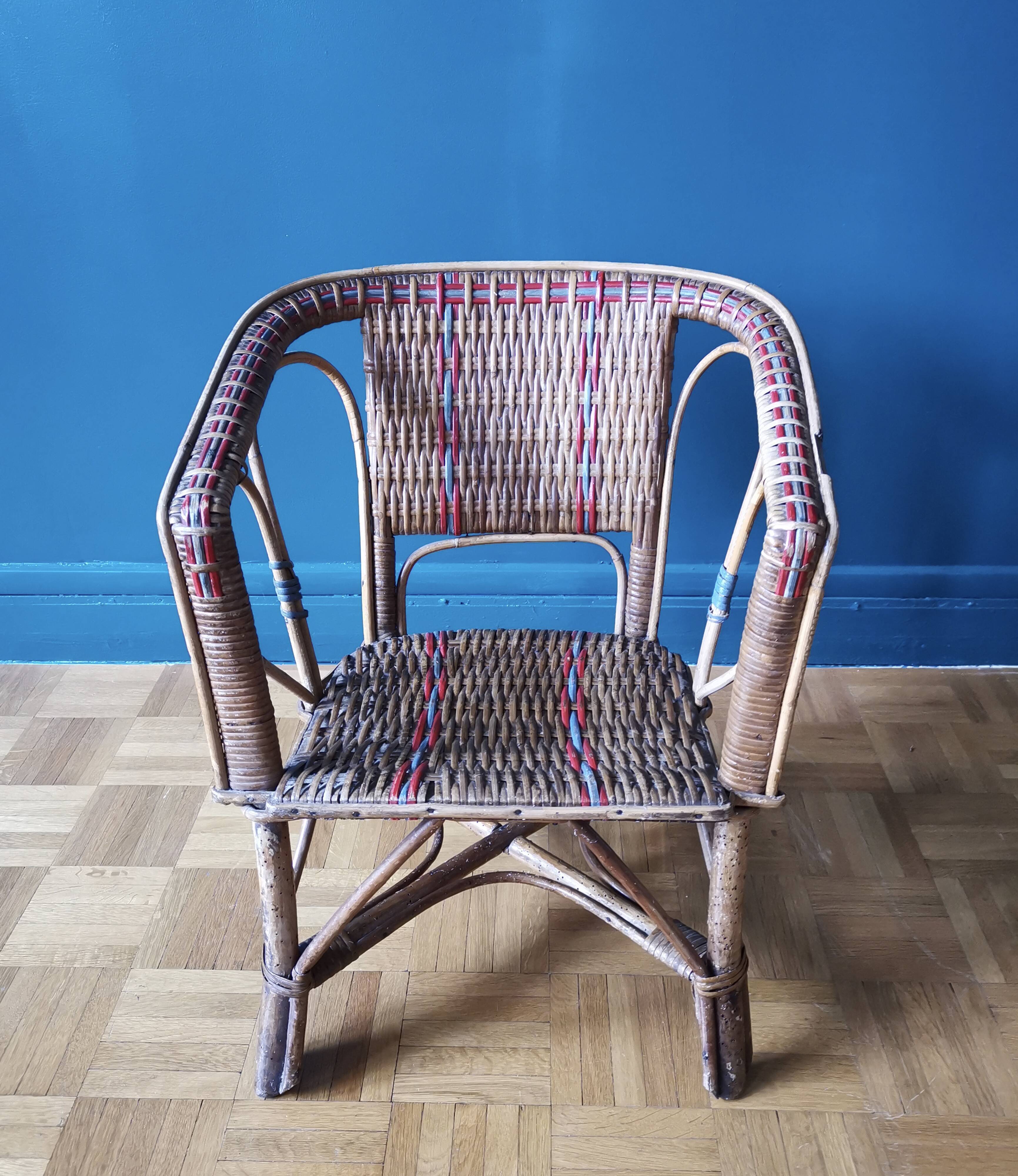 Small child vintage armchair in rattan