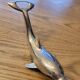 Silver dolphin bottle opener