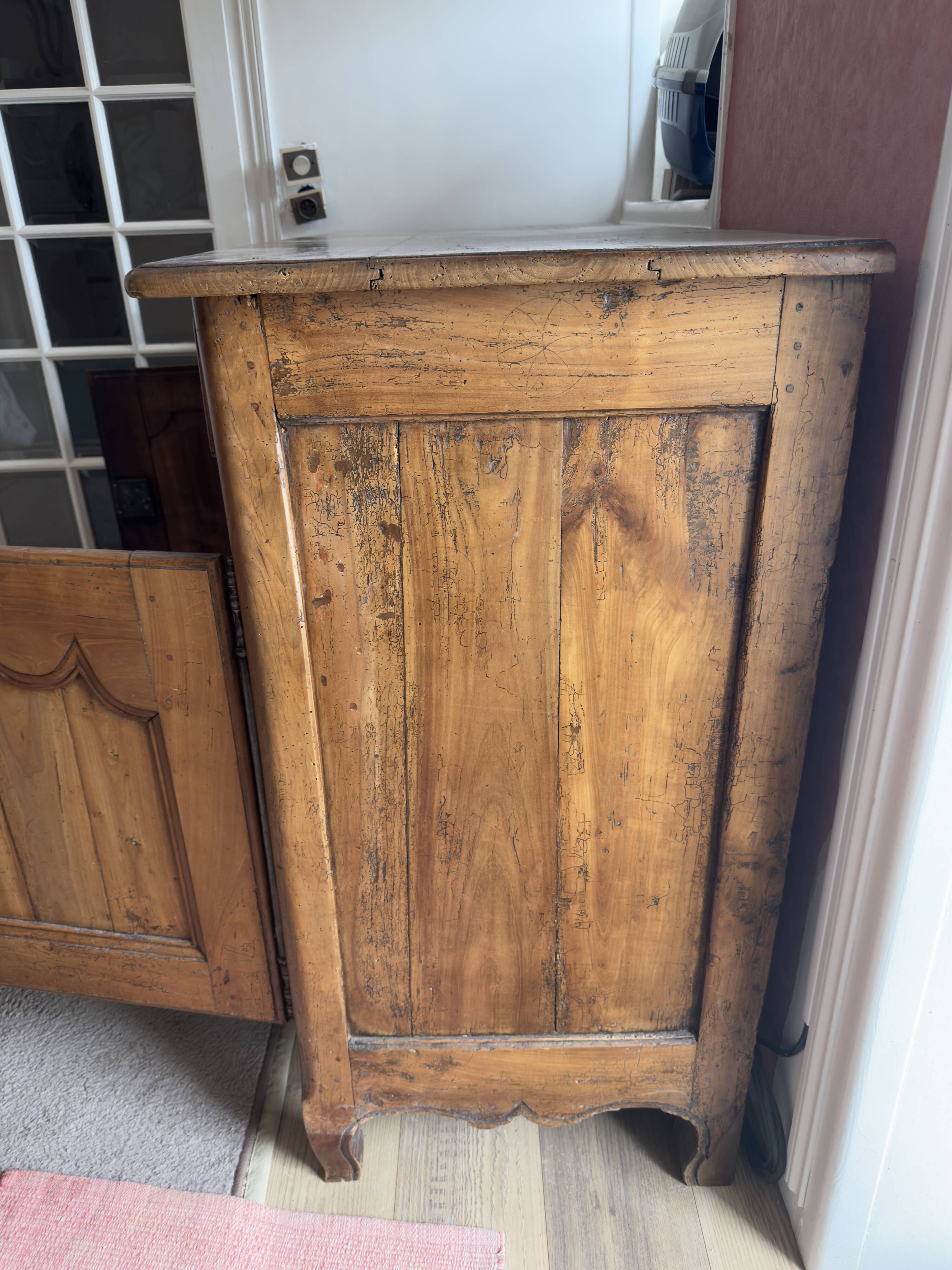 Very old, 2 doors, 2 drawers.