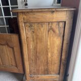 Very old, 2 doors, 2 drawers.