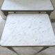 Nesting tables in dark wood and white marble