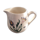 Signed floral decoration pitcher