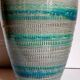Ceramic vase scarified with gray-blue enamel