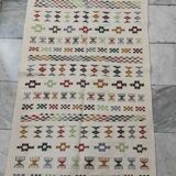 White carpet with multicolored Berber patterns handmade