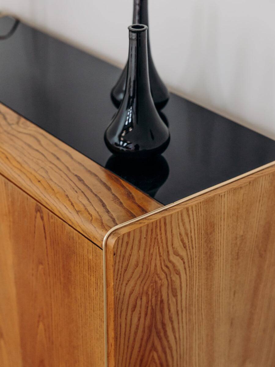 Low wooden sideboard by Bohumil Landsman and Hubert Nepozitek