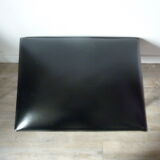 Ottoman foot rest in chrome and black leatherette of the 1950s