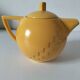 Salins teapot – Memphis design from the 1980s, golden yellow colour.