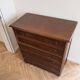 Brown antique-style wooden chest of drawers with 6 drawers.