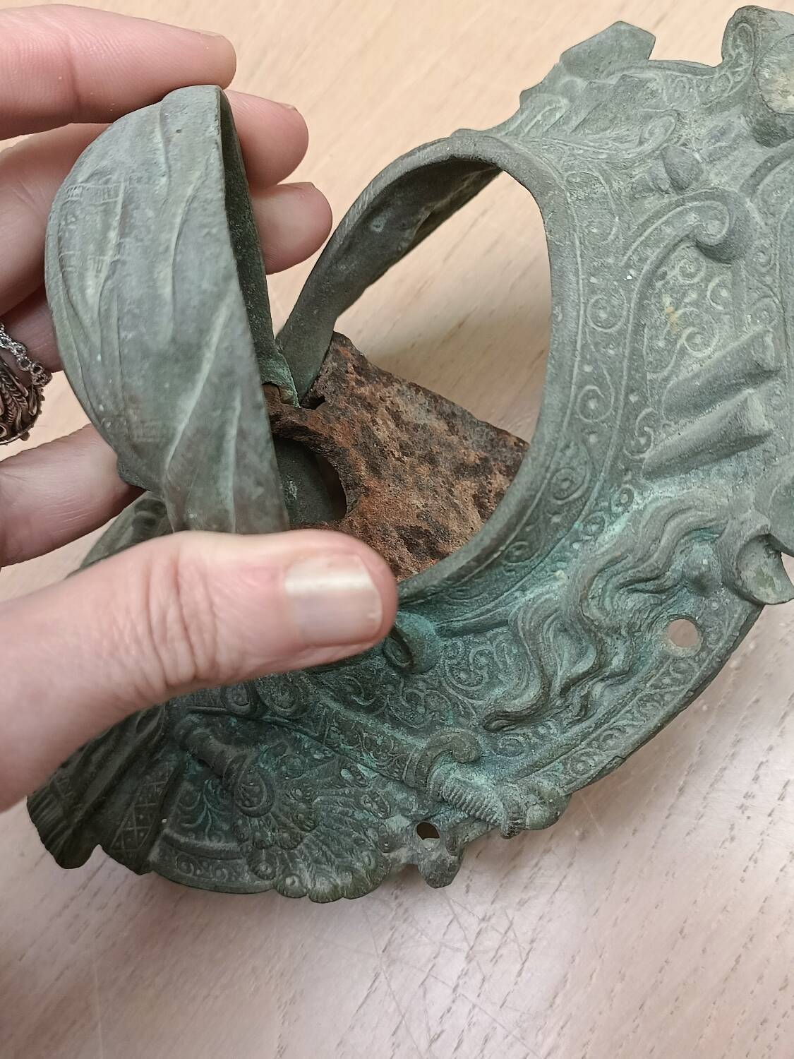 Bronze door knockers and billiard table corners