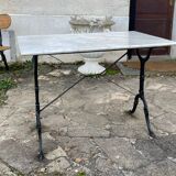 Bistro table with cast iron base, marble top, 20th century