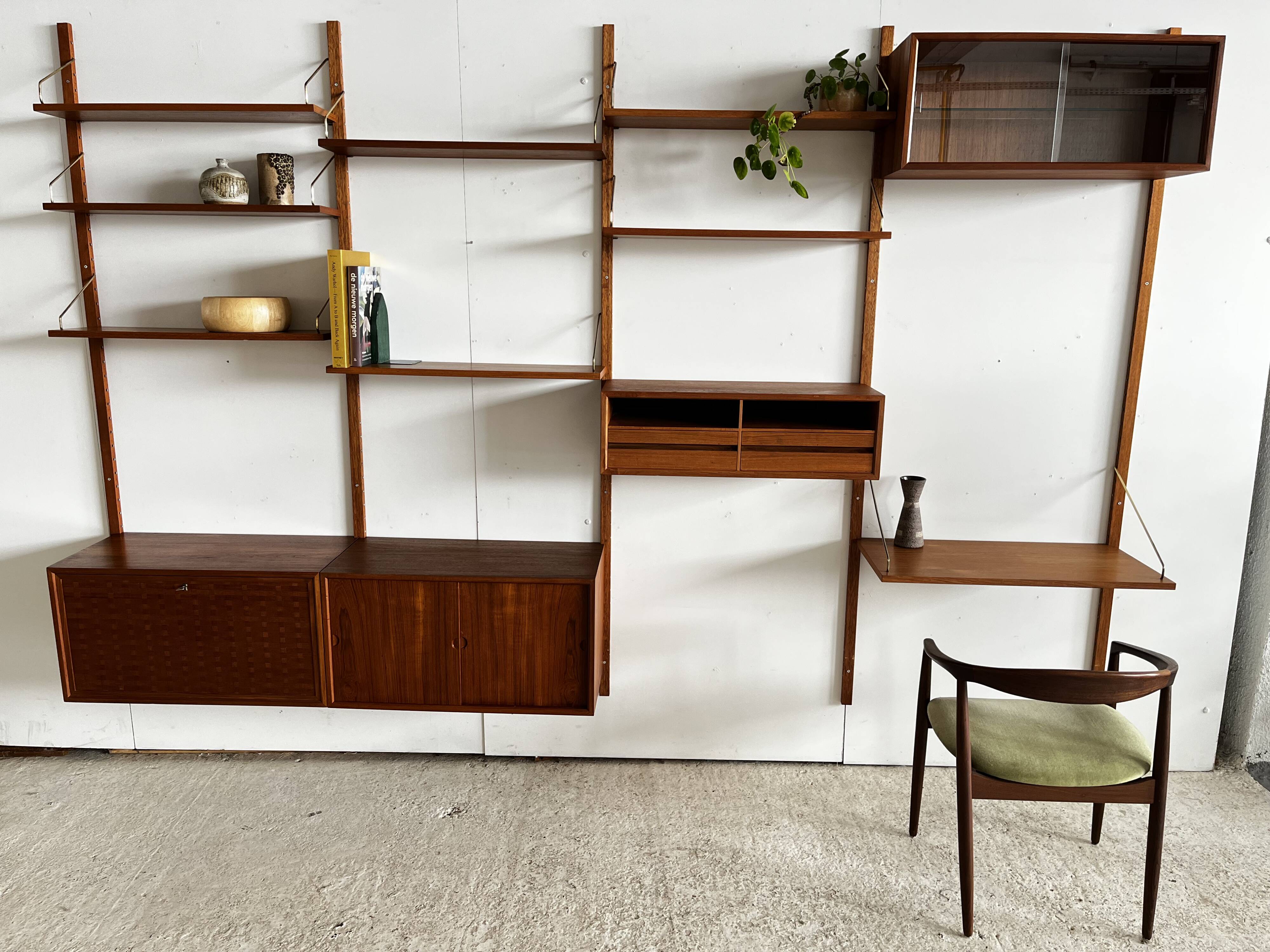 A wall unit with 4 compartments by Poul Cadovius, Denmark, 1960s.