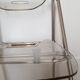Chaise pliante en metal et plexiglas