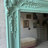 Large antique mercury mirror, patinated blue sculpted frame.