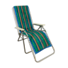 Metal deckchair and vintage green blue fabric