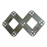 Expandable stainless steel trivet from the 50s and 60s