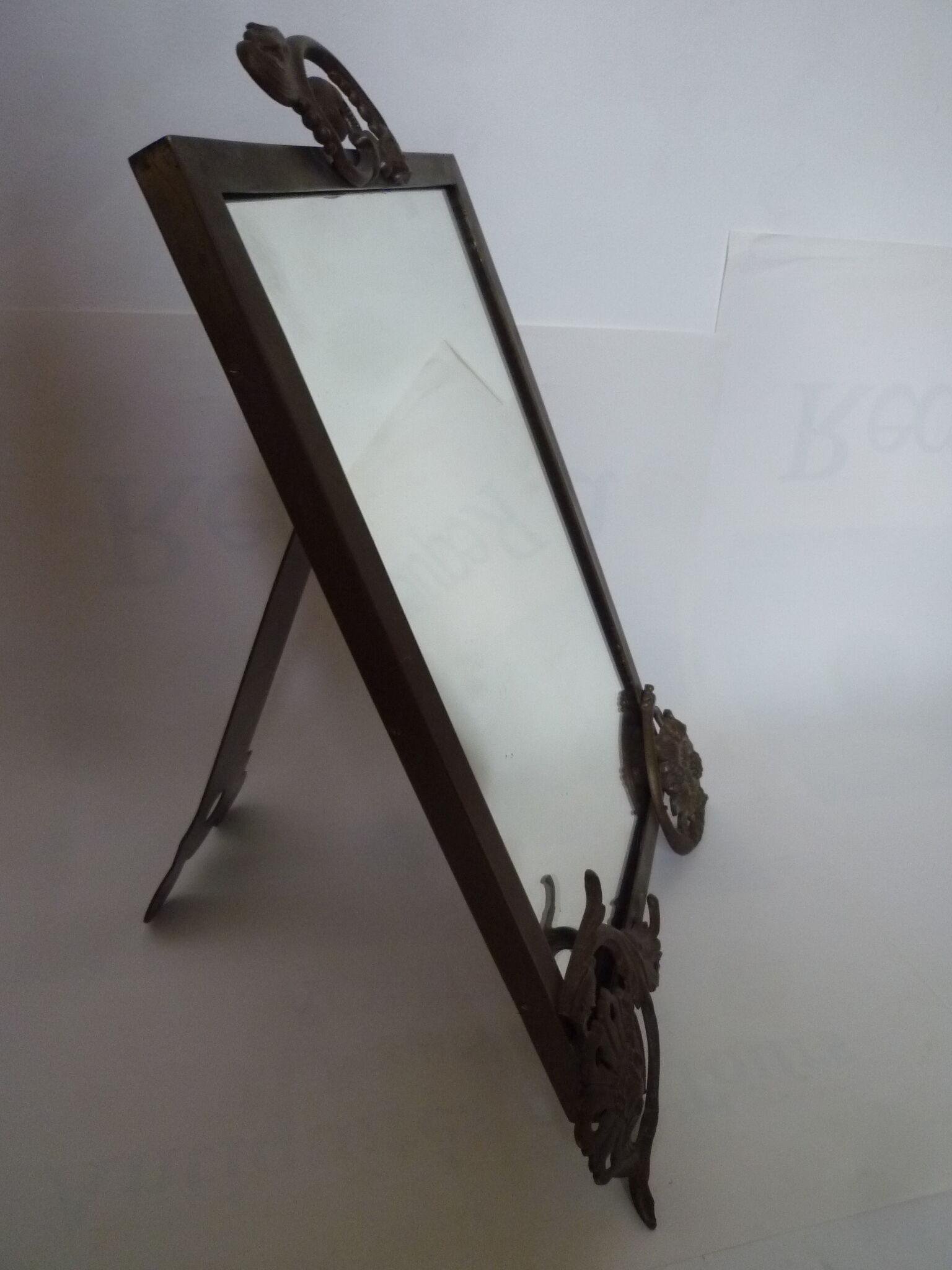 Mirror to ask bronze and brass beginning XXth 32 x 45 cm