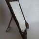 Mirror to ask bronze and brass beginning XXth 32 x 45 cm