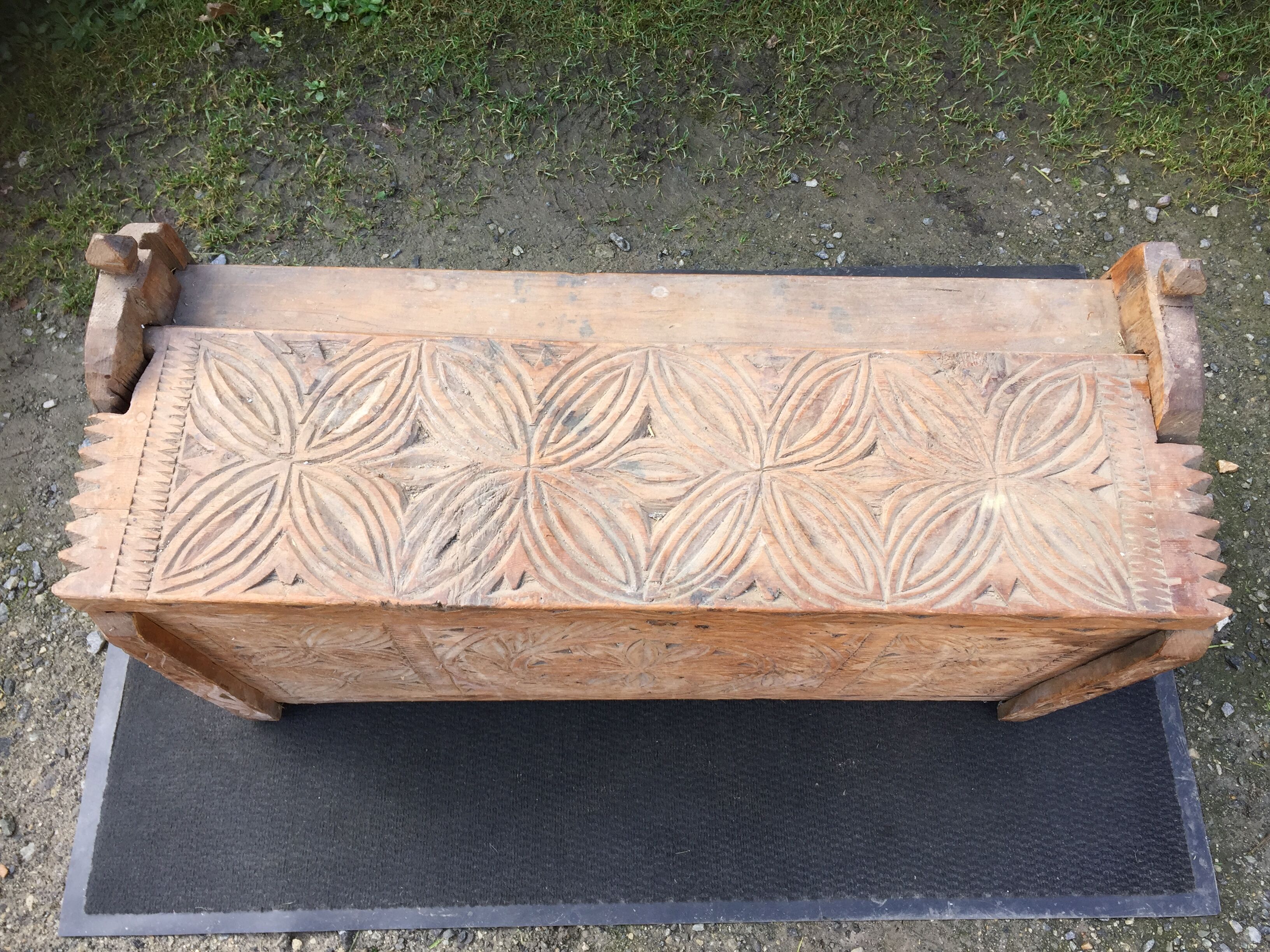 Ancient brutalist chest carved wind rose