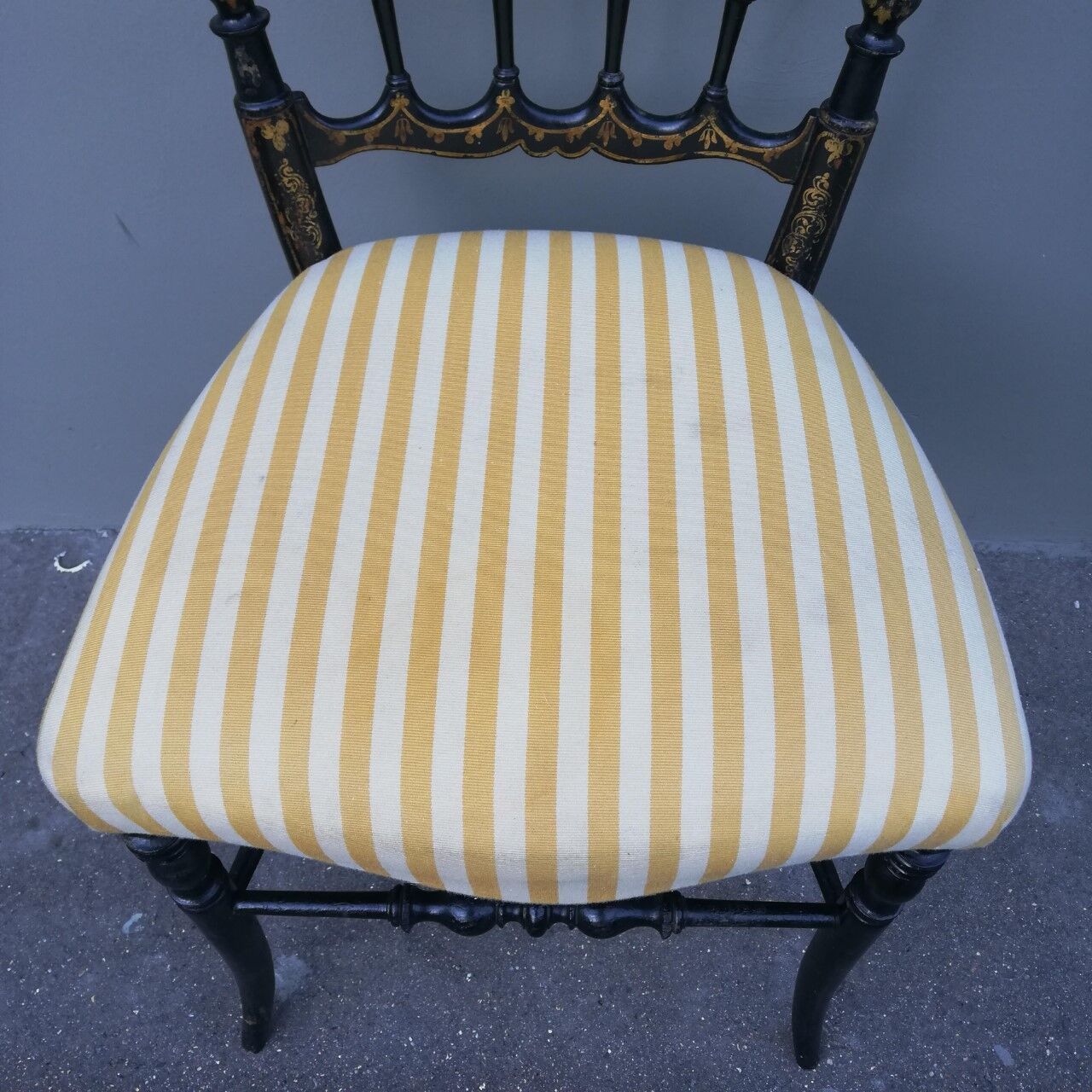 Napoleon III chair late 19th in blackened wood with gilded patterns