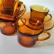 5 vintage amber Duralex cups and saucers