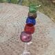 Set of 9 colored port glasses, 5 tulip-shaped and 4 balloons