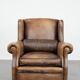 Luxury and large cowhide leather wingback chair in English style