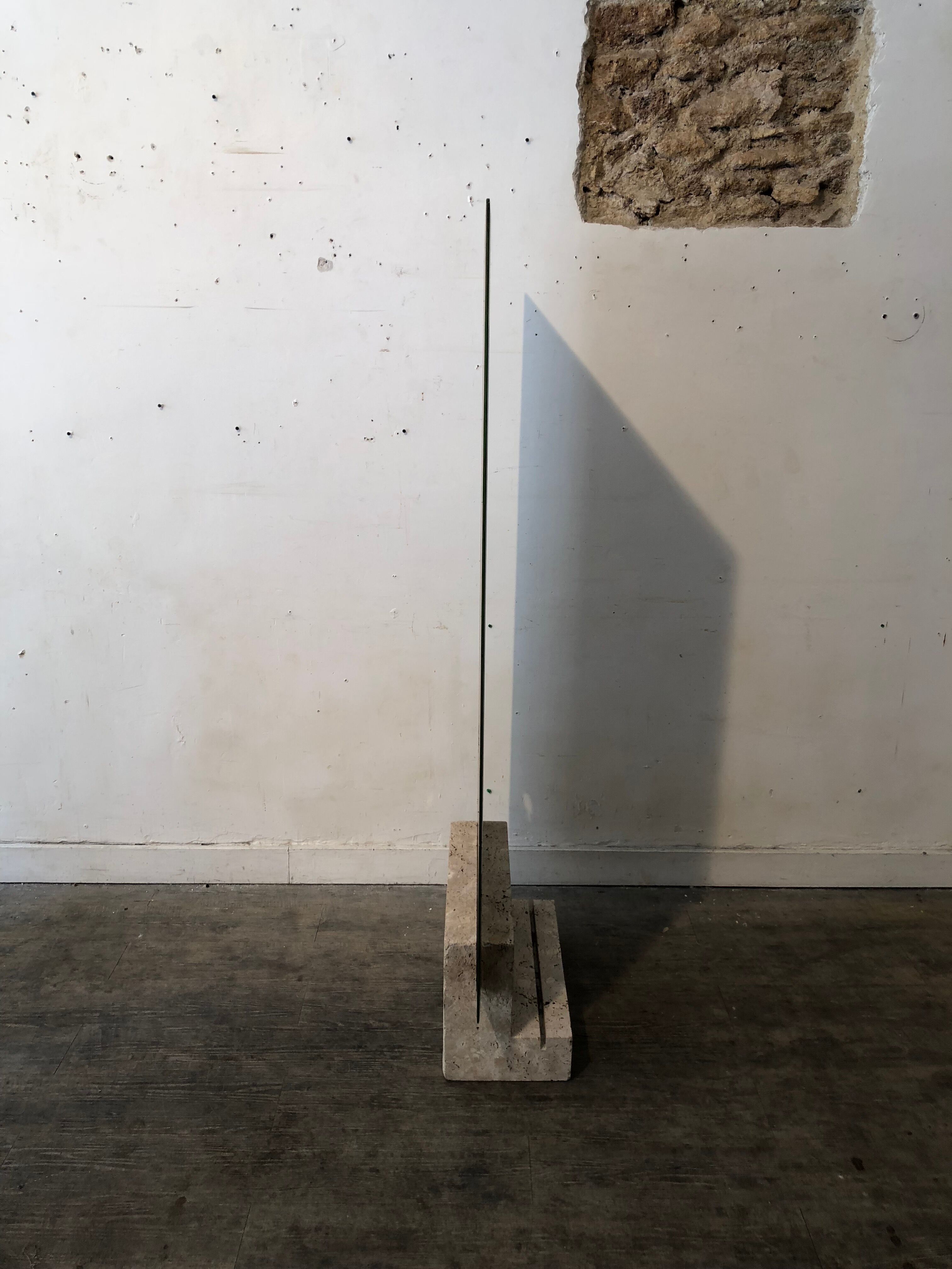 Mirror on foot 1970 travertine