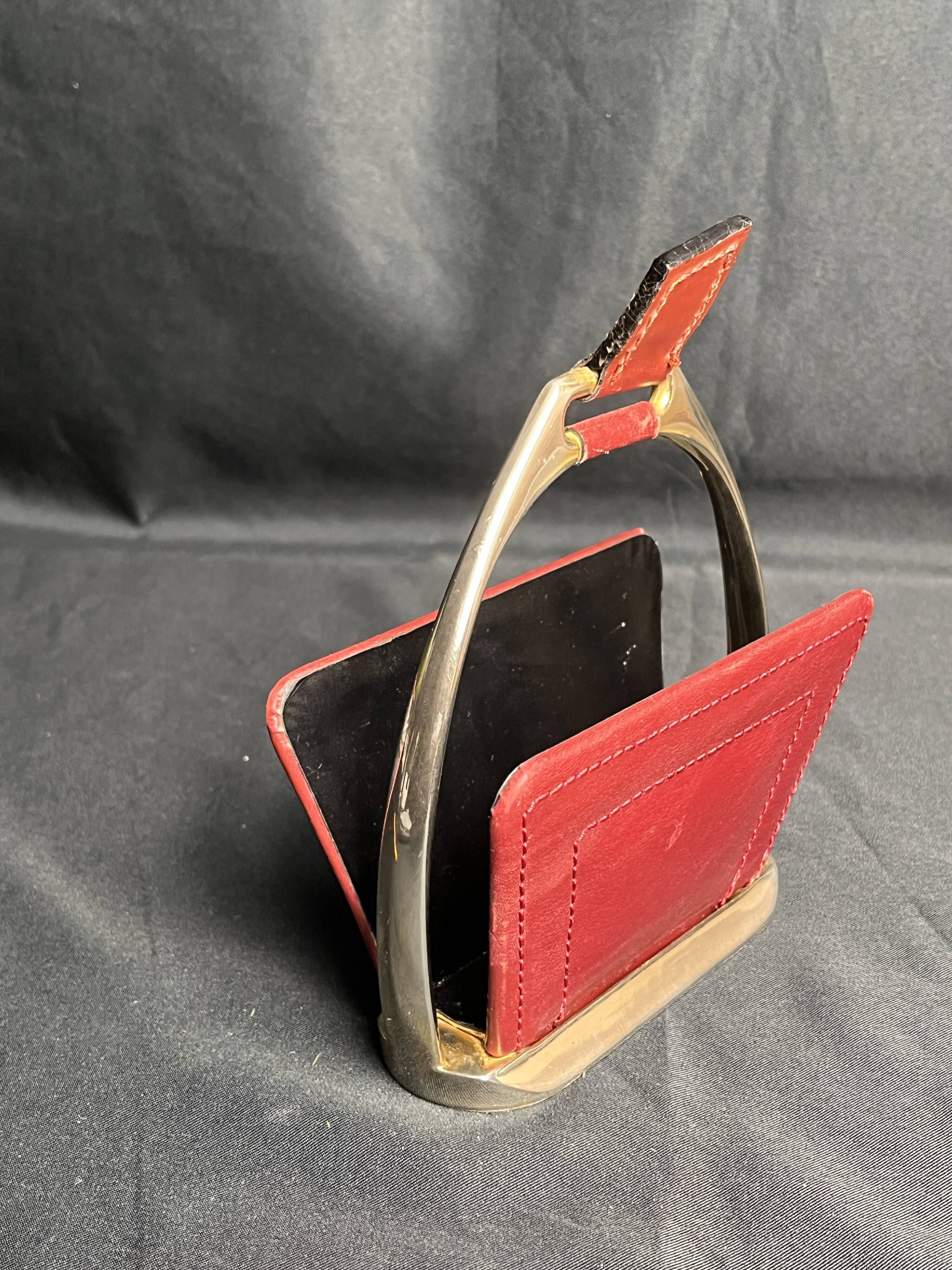 Longchamp, empty pocket document holder with leather and gold metal stirrup from around 1970.