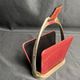 Longchamp, empty pocket document holder with leather and gold metal stirrup from around 1970.