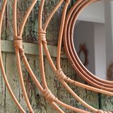 Round rattan mirror