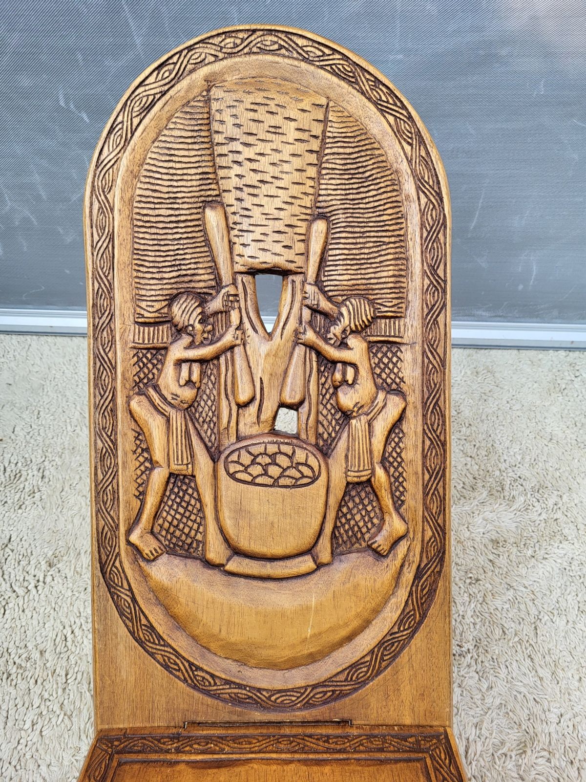Chaise africaine bois sculpté escamotable