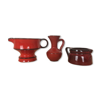 3 red ceramic vases