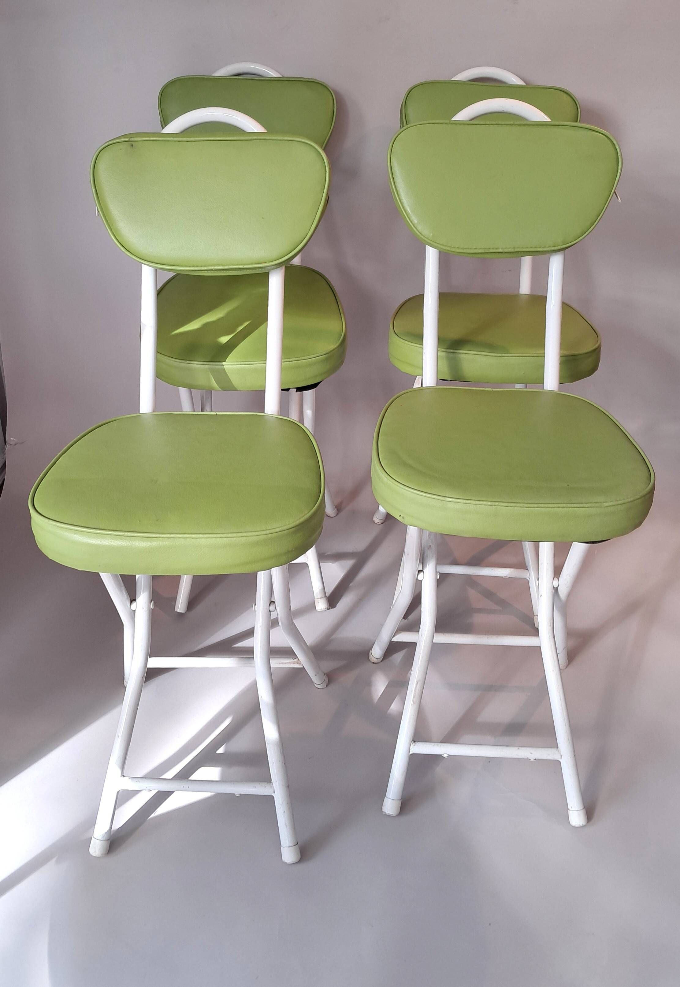 Set of 4 folding cocktail chairs in olive green faux leather from the 1970s.