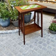 Art Nouveau side table 1910 with double tops in dark oak.