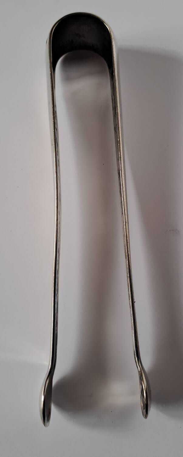 Silver-plated sugar tongs by Christofle